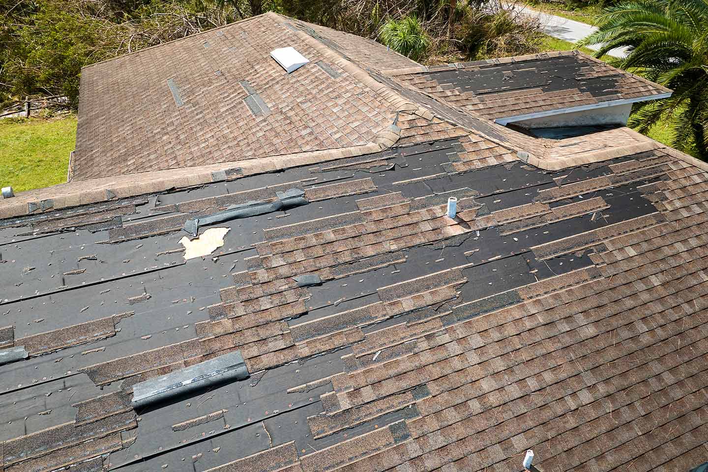Brown Shingles Blown Off Florida Roof